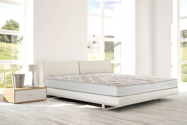 Bedroom with mattress topper